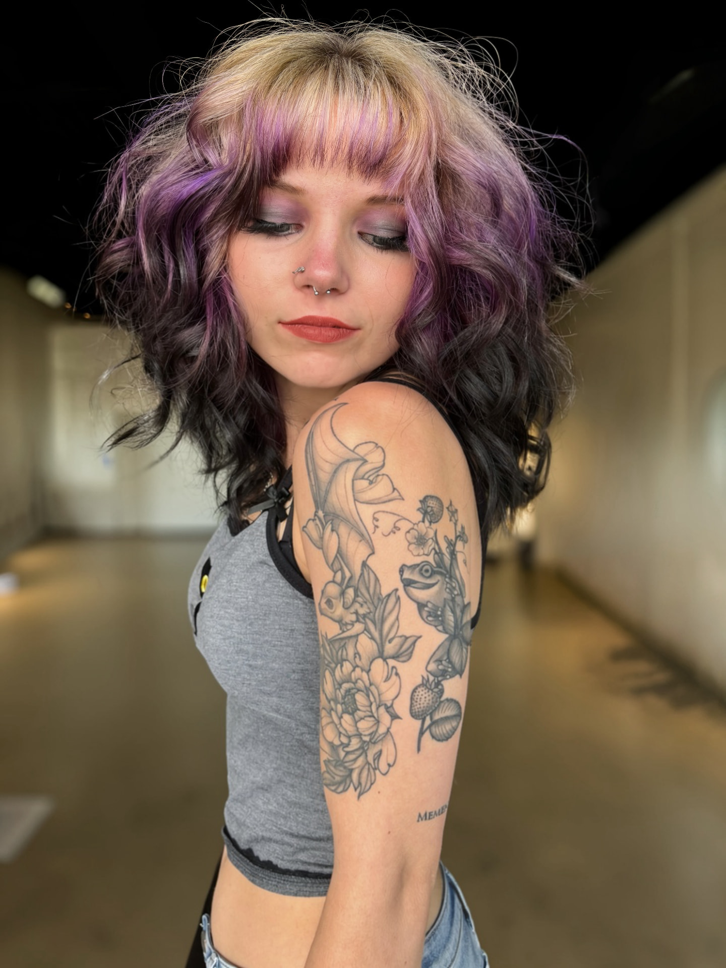 Violet and blonde shag with curtain bangs and textured waves styled at Mill & Mane Hair Co., Tipp City